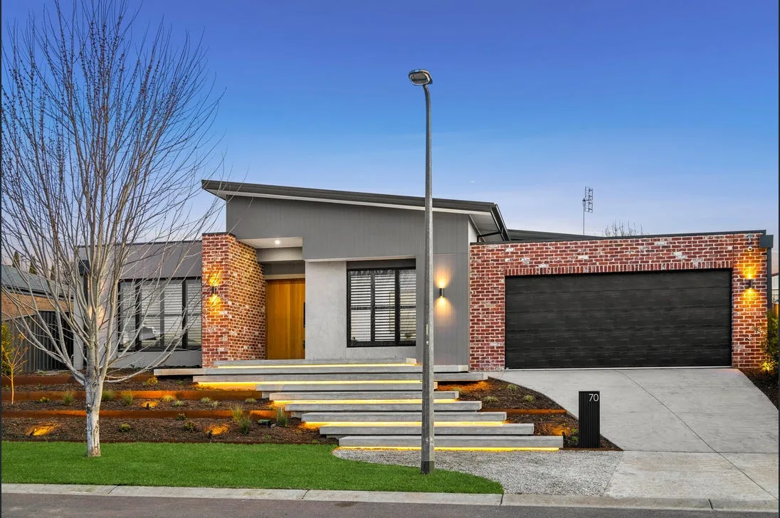 Modern home with a freshly poured concrete driveway and steps in Parramatta